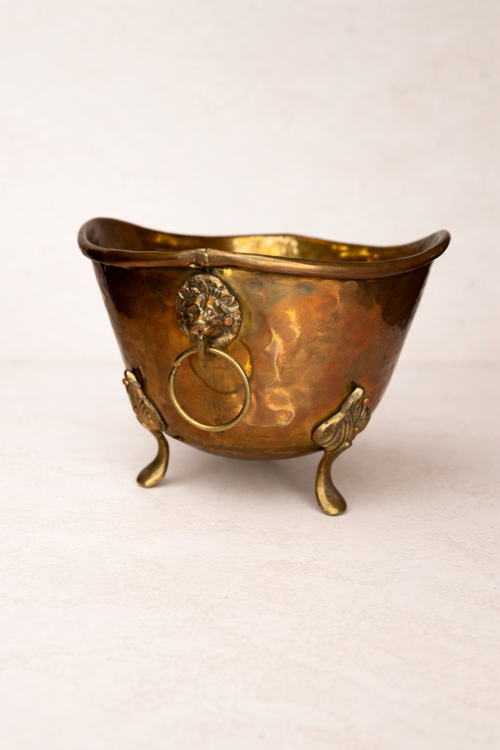 Vintage Hammered Brass Jardinière with Lion Head Ring Handles and Claw Feet