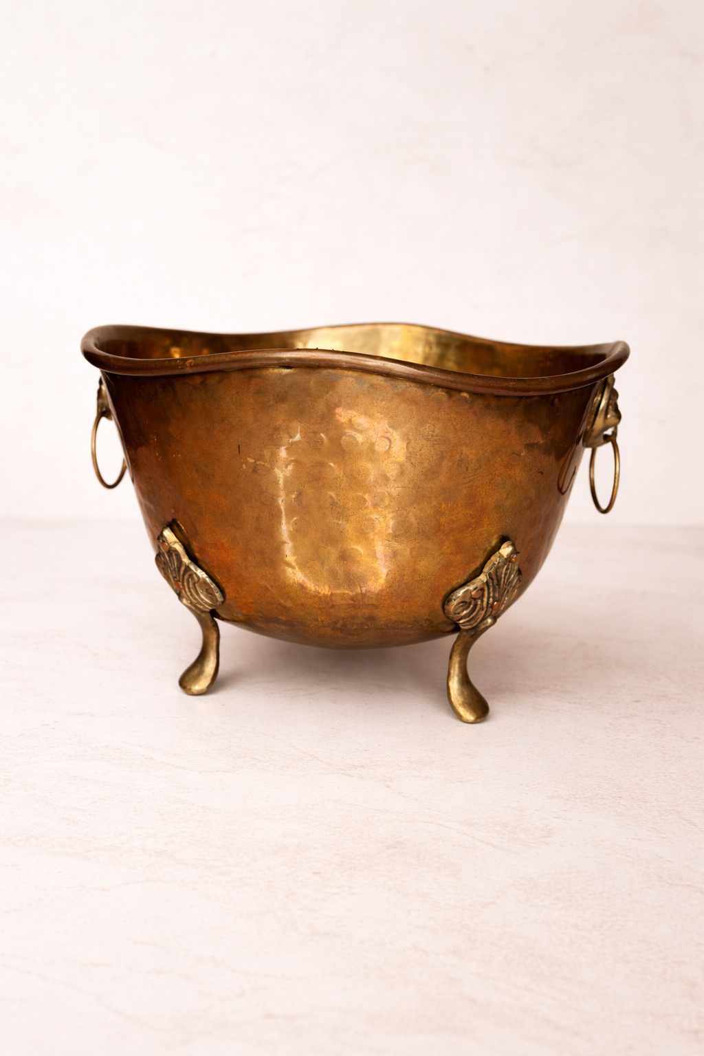Vintage Hammered Brass Jardinière with Lion Head Ring Handles and Claw Feet