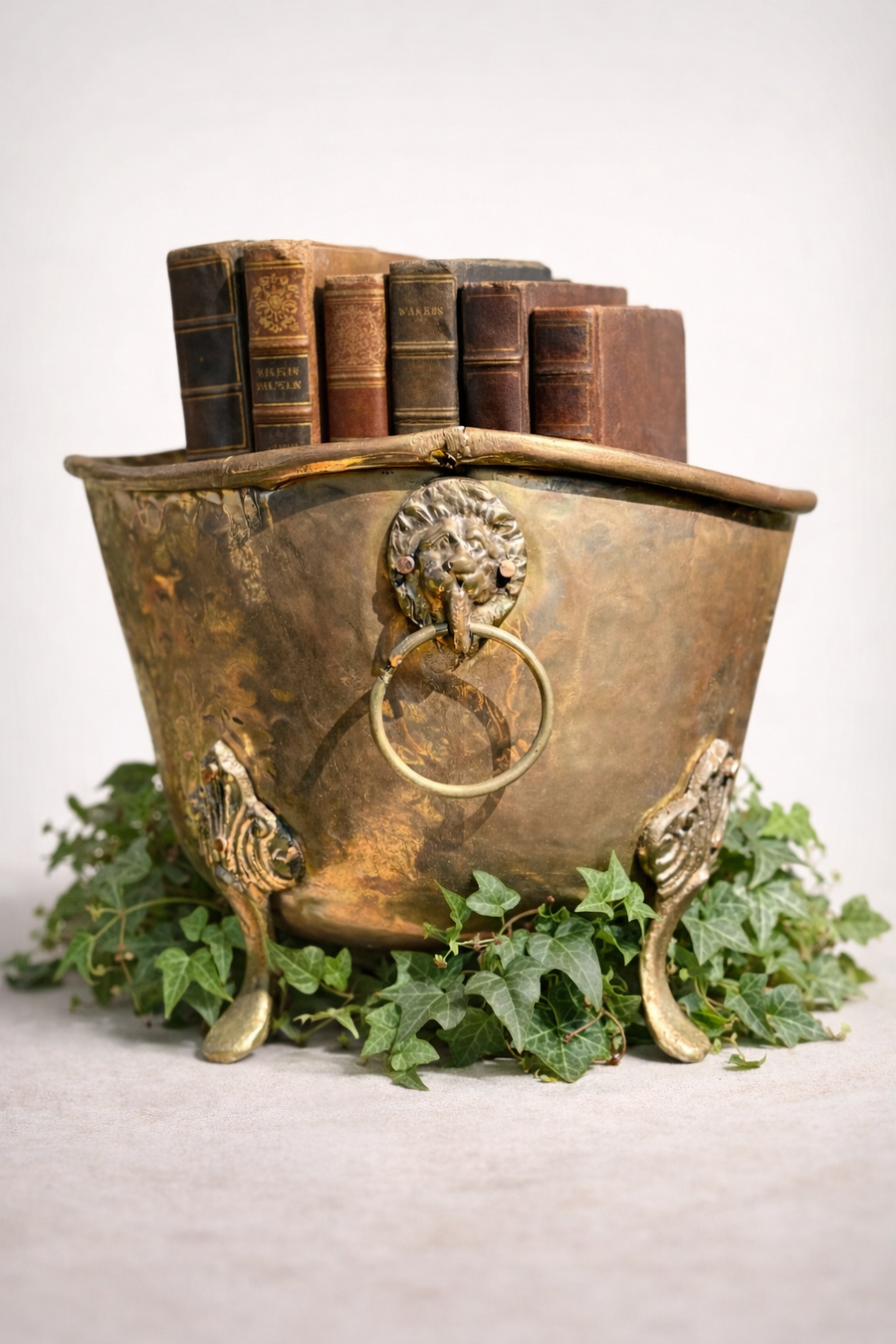 Vintage Hammered Brass Jardinière with Lion Head Ring Handles and Claw Feet